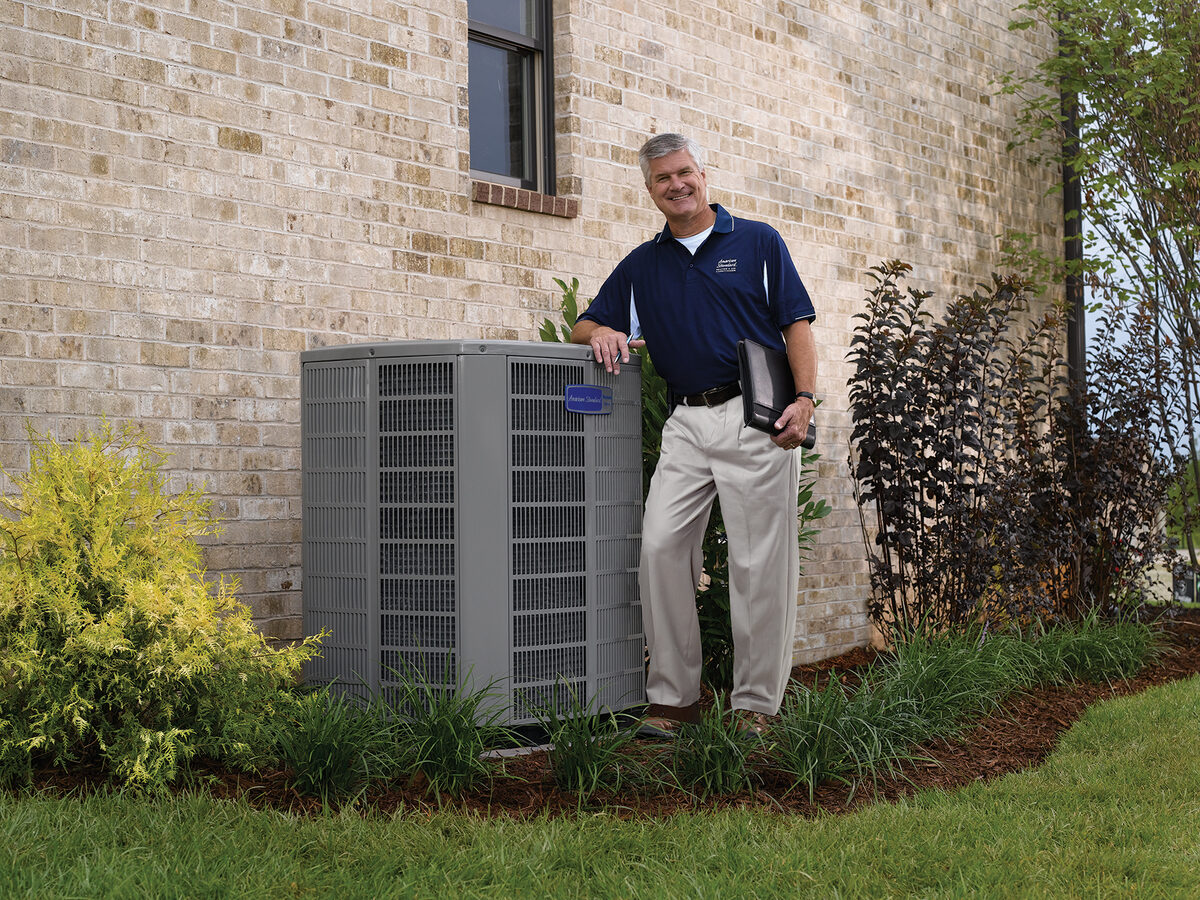 HVAC technician working on equipment